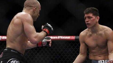 老将难敌重拳+新星闪耀：UFC160上演“回旋踢”KO大戏
